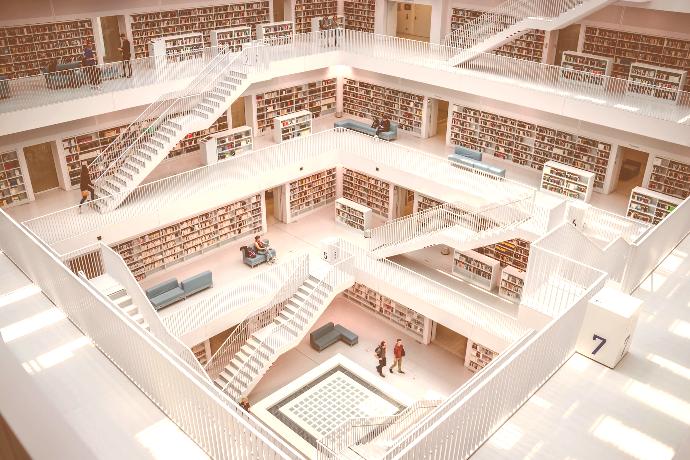 people walking inside library